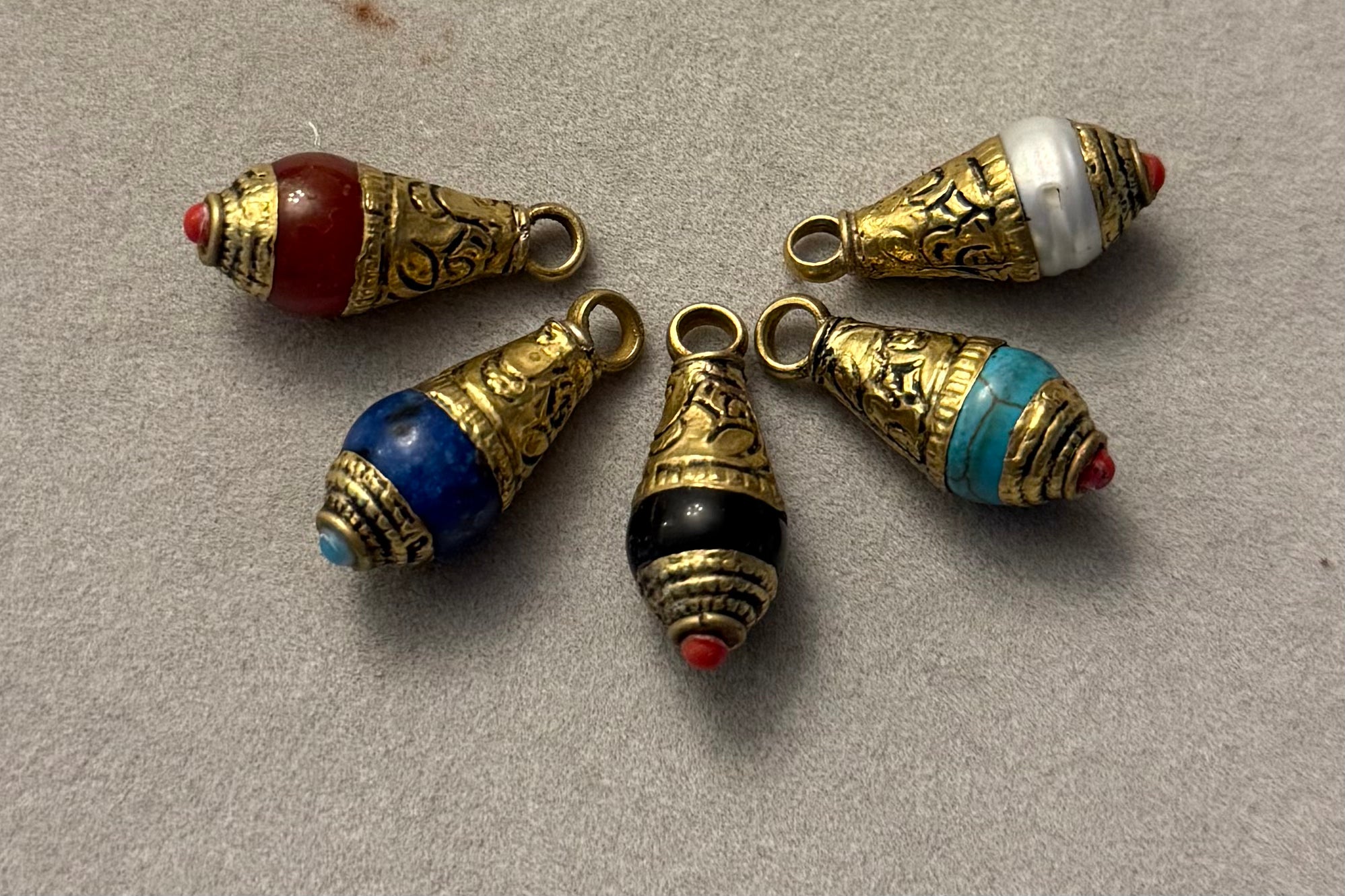 Carved Brass and Gemstone Charm